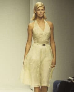 Mrs. Prada arrives. 
